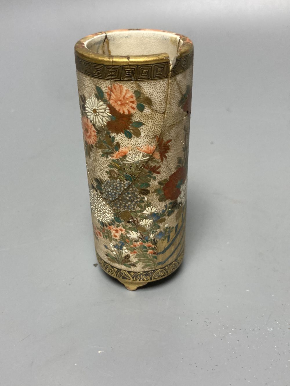 A Japanese satsuma brush pot (a.f.), a similar cloisonne vase and a porcelain tile, tallest 18cm